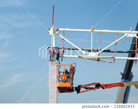 Construction Workers at Work Construction Workers at Work 138802915
