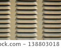 Wide industrial vent pattern beige metal texture abstract background minimal architectural surface copy space 138803018