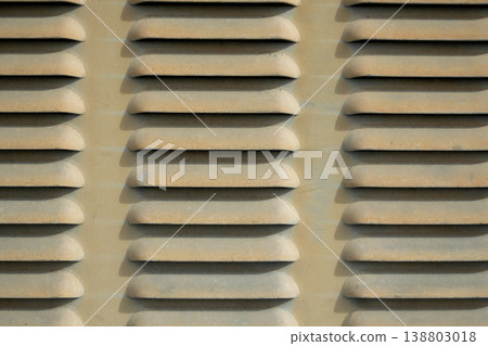 Wide industrial vent pattern beige metal texture abstract background minimal architectural surface copy space Wide industrial vent pattern beige metal texture abstract background minimal architectural surface copy space 138803018