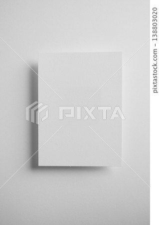 Blank paper mockup with shadow on gray background minimal aesthetic clean design template vertical copy space Blank paper mockup with shadow on gray background minimal aesthetic clean design template vertical copy space 138803020