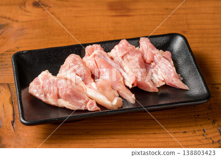 Chicken neck meat: A popular yakitori cut known for its springy texture. Chicken neck meat: A popular yakitori cut known for its springy texture. 138803423