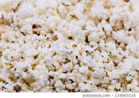 A close-up texture of popcorn filling the entire screen. A close-up texture of popcorn filling the entire screen. 138803516