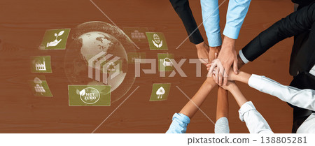 Business team collaboration for sustainable solutions emphasizing environmental awareness with symbols of planet earth and eco-friendly practices Trope 138805281
