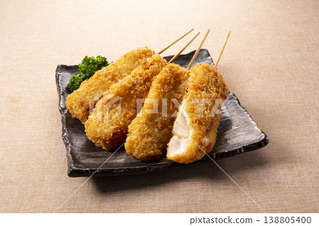 Pork loin and onion skewers Pork loin and onion skewers 138805400