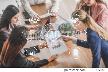 Women Collaborating on Artificial Intelligence Project with Data Visualization and Modern Technology Elements in Office Setting Quark Women Collaborating on Artificial Intelligence Project with Data Visualization and Modern Technology Elements in Office Setting Quark 138805486