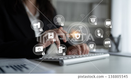 Professional woman interacting with smart home technology icons on a keyboard in a modern office environment showcasing digital security and connectivity Gantry Professional woman interacting with smart home technology icons on a keyboard in a modern office environment showcasing digital security and connectivity Gantry 138805545