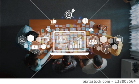 Collaborative Marketing Strategy Session with Diverse Team Analyzing Data and Creating Strategies Using Sticky Notes and Digital Tools. Raster 138805564