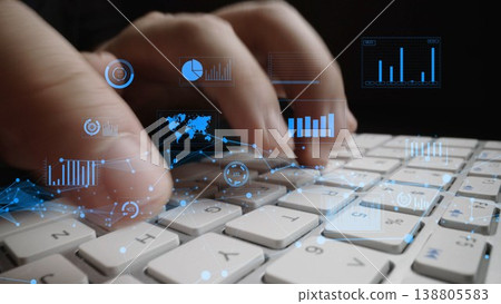 Close-up of Hands Typing on a Keyboard with Data Visualizations and Graphs Representing Technology, Analytics, and Digital Transformation Concepts xenic Close-up of Hands Typing on a Keyboard with Data Visualizations and Graphs Representing Technology, Analytics, and Digital Transformation Concepts xenic 138805583