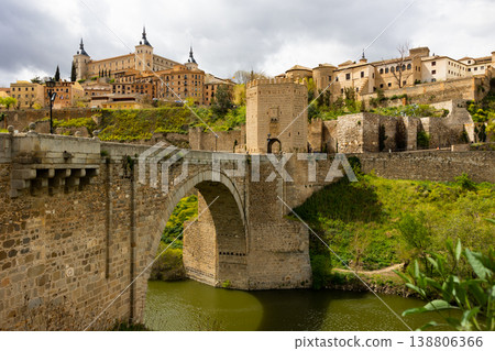 Landscape with a view of the Alcantara Bridge and the Alcazar de Toledo Castle Landscape with a view of the Alcantara Bridge and the Alcazar de Toledo Castle 138806366