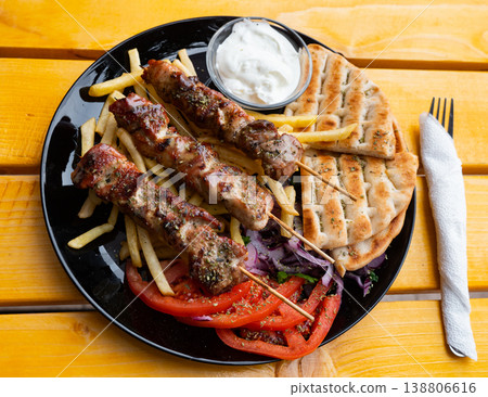 Albanian cuisine, shish kebab with vegetables Albanian cuisine, shish kebab with vegetables 138806616