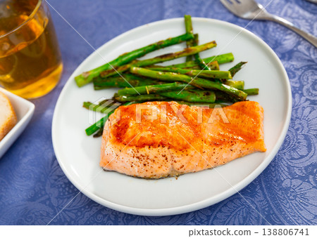 Sliced tasty salmon with asparagus 138806741
