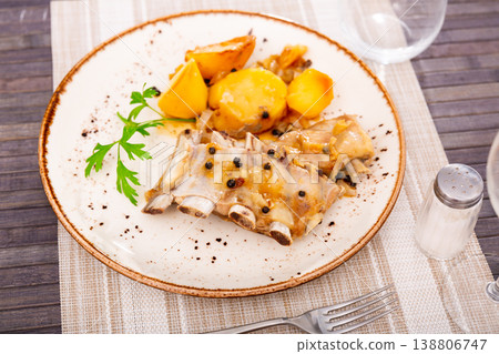 Nicely laid out dish of pork ribs with potatoes siding Nicely laid out dish of pork ribs with potatoes siding 138806747
