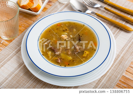 Soup with assorted mushrooms, vegetables and pork 138806755