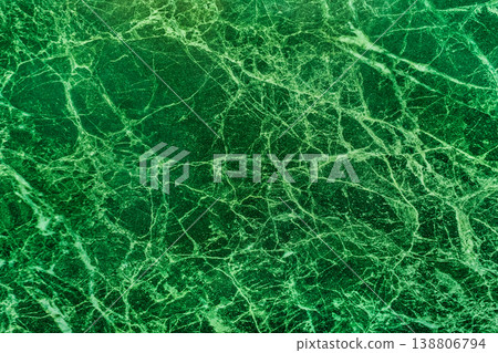 Malachite slab green marble verdant surface cracks kitchen interior structure abstract cracked pattern texture emerald background Malachite slab green marble verdant surface cracks kitchen interior structure abstract cracked pattern texture emerald background 138806794