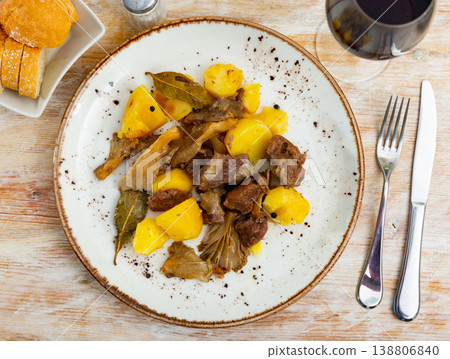 Braised veal with potato and forest mushrooms Braised veal with potato and forest mushrooms 138806840