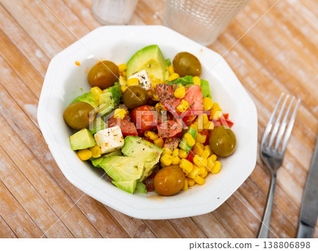 Easy salad with vegetables and fresh cheese Easy salad with vegetables and fresh cheese 138806898