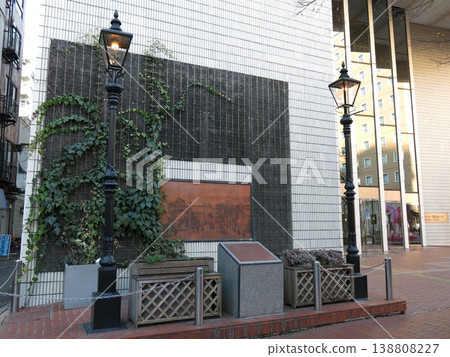 A monument commemorating "Japan's first gas lamp" (reconstructed gas lamp and wall relief) located in Bashamichi, Naka Ward, Yokohama City. A monument commemorating "Japan's first gas lamp" (reconstructed gas lamp and wall relief) located in Bashamichi, Naka Ward, Yokohama City. 138808227