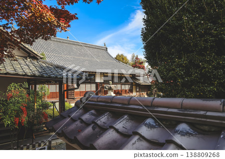 Nov 24 2025 Zen temple main hall framed by seasonal garden windows Nov 24 2025 Zen temple main hall framed by seasonal garden windows 138809268