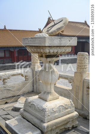 Ancient sundial on carved stone pedestal of 15th century in the Forbidden City in Beijing, China 138809316