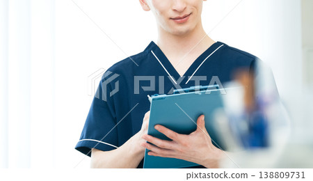 Young male healthcare worker Young male healthcare worker 138809731