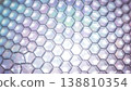 Abstract hexagonal pattern with translucent surfaces reflecting light, creating a colorful and dynamic visual effect suitable for backgrounds and design projects 138810354