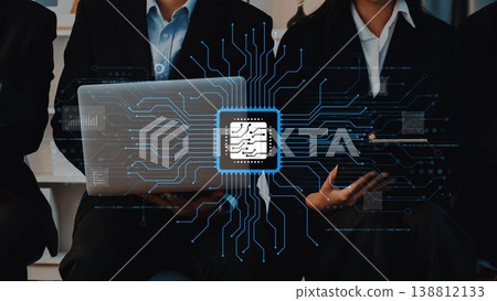 Professionals Engaged in Technology Discussion with Laptops and Circuit Pattern Graphics Representing Digital Innovation in a Business Environment. Raster 138812133