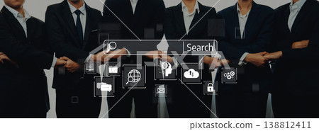 Group of Business Professionals in Suits Engaged in Team Collaboration with Digital Search Interface and Technology Icons on Display Trope Group of Business Professionals in Suits Engaged in Team Collaboration with Digital Search Interface and Technology Icons on Display Trope 138812411