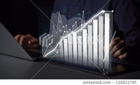Professional analysis of business growth with financial charts on a digital screen showing upward trends in a modern workspace environment. Copula Professional analysis of business growth with financial charts on a digital screen showing upward trends in a modern workspace environment. Copula 138812795