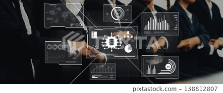 Business professionals analyzing data trends with futuristic digital interface showing graphs, charts, and statistics for strategic decision-making and growth insights Trope Business professionals analyzing data trends with futuristic digital interface showing graphs, charts, and statistics for strategic decision-making and growth insights Trope 138812807