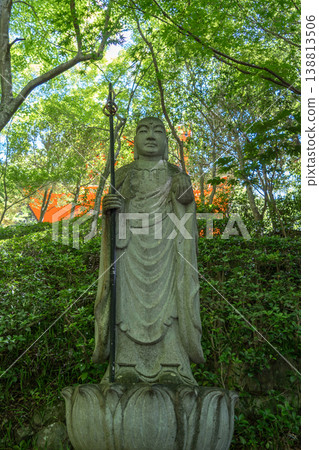 Monk statue in serene Mitaki-Dera temple garden in Hiroshima Monk statue in serene Mitaki-Dera temple garden in Hiroshima 138813506