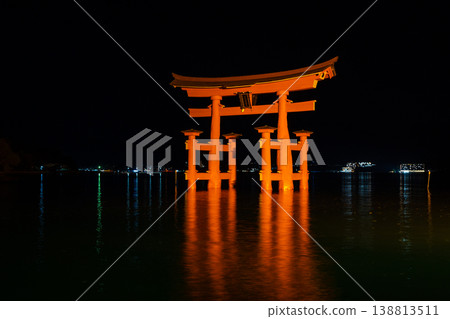 Itsukushima Shrine torii illuminated at night on Miyajima island 138813511