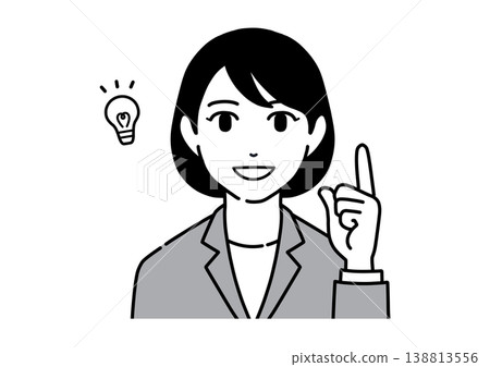 A young woman in a suit smiles and points; employee 138813556