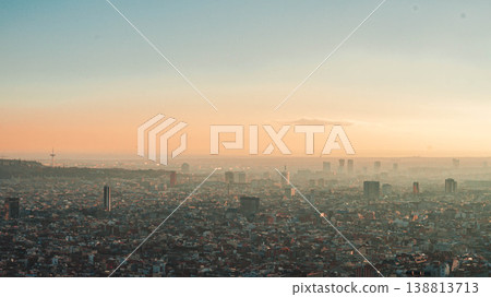 Barcelona panoramic skyline at sunset with wide city view and warm sky Barcelona panoramic skyline at sunset with wide city view and warm sky 138813713