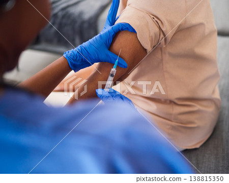 Hands, nurse and needle for arm vaccine, medical and healthcare treatment for virus safety, flu and home wellness. Patient, doctor and person with injection syringe for medicine, covid and vitamin Hands, nurse and needle for arm vaccine, medical and healthcare treatment for virus safety, flu and home wellness. Patient, doctor and person with injection syringe for medicine, covid and vitamin 138815350