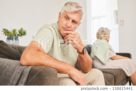 Senior man, fight and thinking of divorce, breakup and stress of sad separation on sofa at home. Frustrated couple on couch in conflict, crisis and problem of drama, bad marriage or emotional anxiety 138815441