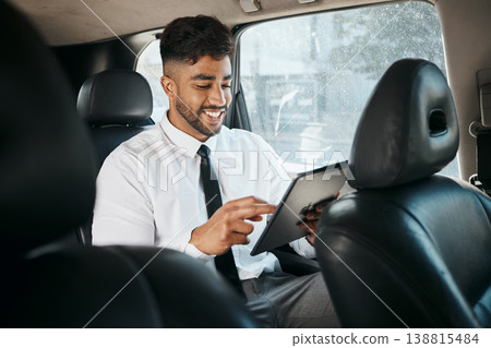 Business man, tablet and travel in car for online search, trading data and reading stock market information. Indian trader scroll on digital technology, financial website or driving in taxi transport Business man, tablet and travel in car for online search, trading data and reading stock market information. Indian trader scroll on digital technology, financial website or driving in taxi transport 138815484