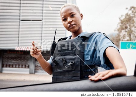 Portrait, drivers license or police officer in city to check info for law enforcement, protection or street safety. Black woman, traffic stop or cop on security patrol for road block or crime justice 138815712