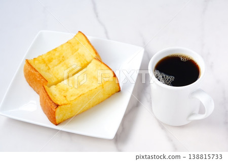 French Toast and Coffee - Thick-cut French toast and freshly brewed coffee for breakfast French Toast and Coffee - Thick-cut French toast and freshly brewed coffee for breakfast 138815733