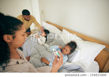 Bed, thermometer check and children sick from cold virus, fever or disease with worried mother helping, aid or family support. Home bedroom, parents stress or mom reading temperature test of ill kids Bed, thermometer check and children sick from cold virus, fever or disease with worried mother helping, aid or family support. Home bedroom, parents stress or mom reading temperature test of ill kids 138815800