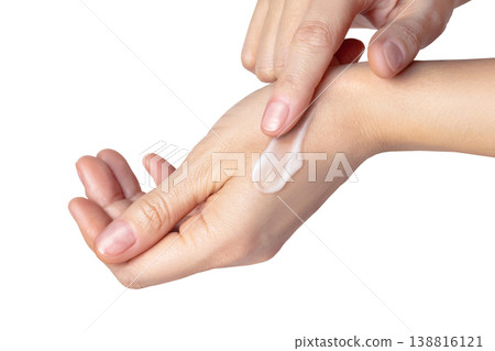 Woman hands with a white swatch with a smear of cream. Beautiful care concept, skin care, hand care, facial care. Isolated on white background photo close up Woman hands with a white swatch with a smear of cream. Beautiful care concept, skin care, hand care, facial care. Isolated on white background photo close up 138816121