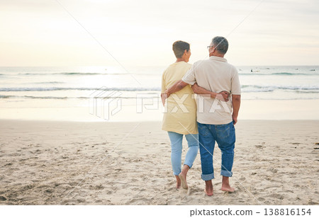 Senior couple hug, back and beach, ocean and travel with bonding and love, trust and marriage outdoor. Adventure, tropical holiday and waves, man and woman with loyalty and life partner in nature 138816154