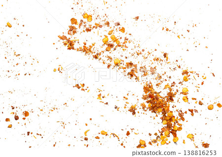 dried red chili pepper flakes and seeds isolated on white background dried red chili pepper flakes and seeds isolated on white background 138816253