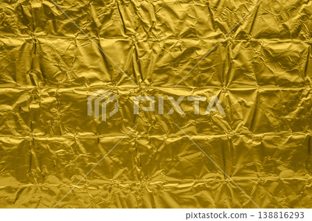 Luxury shiny metallic golden foil crumpled texture background 138816293
