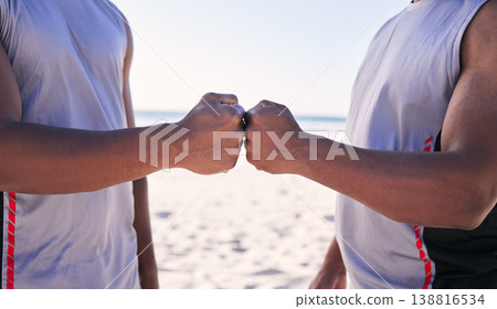 Fist bump, fitness and teamwork with men on the beach for sports motivation together in unity or solidarity. Hands, exercise and support with an athlete team outdoor on the sand for competition Fist bump, fitness and teamwork with men on the beach for sports motivation together in unity or solidarity. Hands, exercise and support with an athlete team outdoor on the sand for competition 138816534