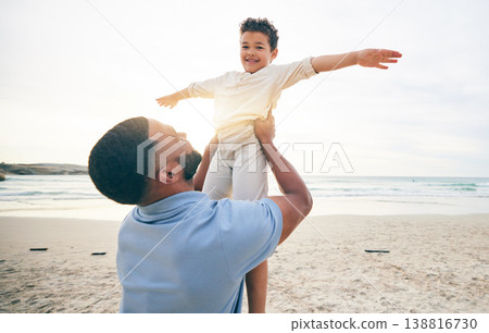 Happy, father and son playing, beach and summer holiday with happiness, travel and bonding. Portrait, dad and male child on a seaside vacation, quality time and fun on a break, activity and smile Happy, father and son playing, beach and summer holiday with happiness, travel and bonding. Portrait, dad and male child on a seaside vacation, quality time and fun on a break, activity and smile 138816730