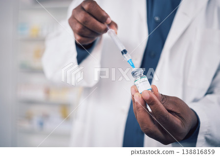 Hands, doctor and vaccine, injection and container with medicine, healthcare and safety from virus zoom. Person in pharmacy with drugs, liquid and syringe with glass vial, pharmaceutical and health Hands, doctor and vaccine, injection and container with medicine, healthcare and safety from virus zoom. Person in pharmacy with drugs, liquid and syringe with glass vial, pharmaceutical and health 138816859