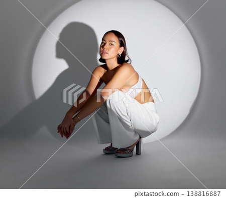 Beauty, portrait and fashion with spotlight on woman in studio for cosmetics, creative and art. Design, glamour and luxury with face of person on white background for elegant, trendy and makeup 138816887