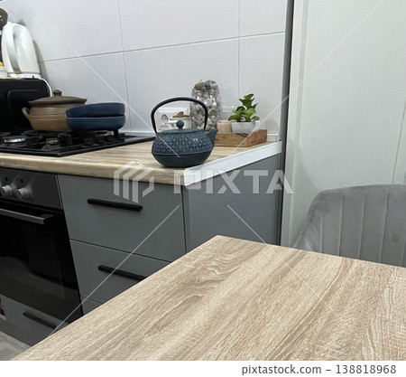 table with teapot in the kitchen table with teapot in the kitchen 138818968