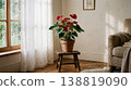 Red anthuriums by the window and sunlight; vibrant interior greenery. 138819090