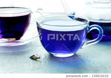 Blue tea, an infusion of butterfly pea flowers, with another cup Blue tea, an infusion of butterfly pea flowers, with another cup 138819220